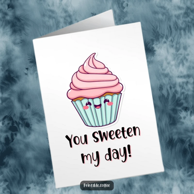 Funny free printable congratulations card showing a delighted cupcake character enthusiastically wiggling its frosting.